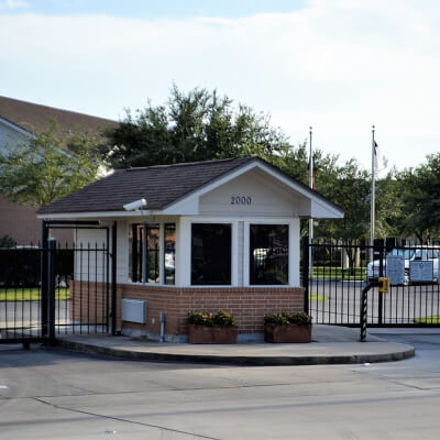 gate-access HID keyless entry pad on a wall